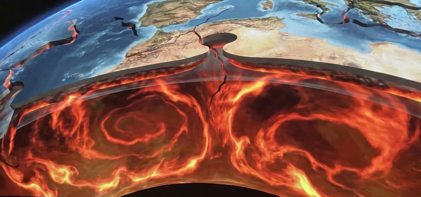 Cinematic cross-section of Earth showing convection currents in the molten mantle driving tectonic plates.